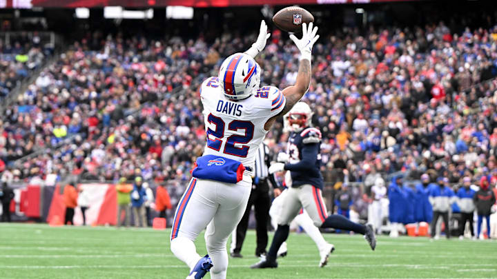 Jan 5, 2025; Foxborough, MA; Buffalo Bills running back Ray Davis (22) makes a catch for a touchdown against the New England Patriots during the first half at Gillette Stadium. Jan 5, 2025; Foxborough, MA; Buffalo Bills running back Ray Davis (22) makes a catch for a touchdown against the New England Patriots during the first half at Gillette Stadium.