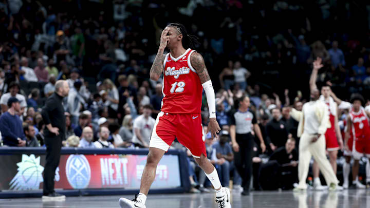 Mar 7, 2025; Dallas, Texas, USA;  Memphis Grizzlies guard Ja Morant (12) reacts after scoring during the fourth quarter  against the Dallas Mavericks at American Airlines Center. Mandatory Credit: Kevin Jairaj-Imagn Images