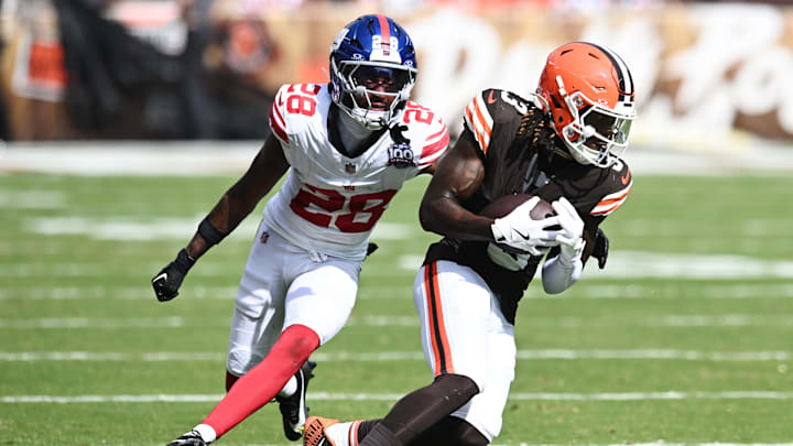 Sep 22, 2024; Cleveland, Ohio, USA; Cleveland Browns wide receiver Jerry Jeudy (3) runs with the ball after a catch as New York Giants cornerback Cor'Dale Flott (28) defends during the second half at Huntington Bank Field. Sep 22, 2024; Cleveland, Ohio, USA; Cleveland Browns wide receiver Jerry Jeudy (3) runs with the ball after a catch as New York Giants cornerback Cor'Dale Flott (28) defends during the second half at Huntington Bank Field.