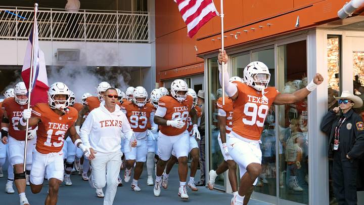 Texas Longhorns Head Coach Steve Sarkisian and players enter the field. Mandatory Credit: Scott Wachter-Imagn Images Texas Longhorns Head Coach Steve Sarkisian and players enter the field. Mandatory Credit: Scott Wachter-Imagn Images