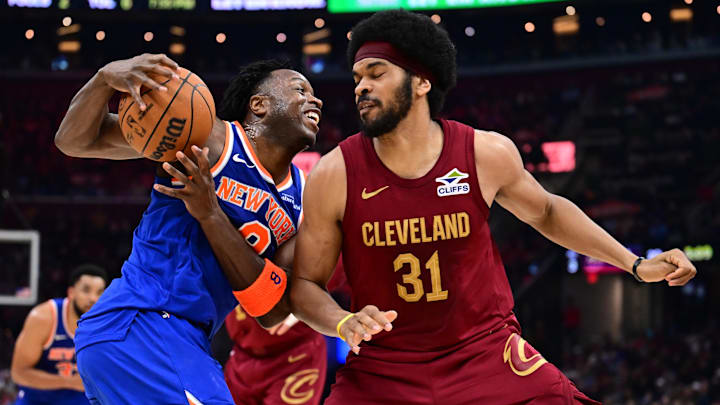New York Knicks forward OG Anunoby drives to the basket against Cleveland Cavaliers center Jarrett Allen (31) during the first half at Rocket Arena. Mandatory Credit: Ken Blaze-Imagn Images