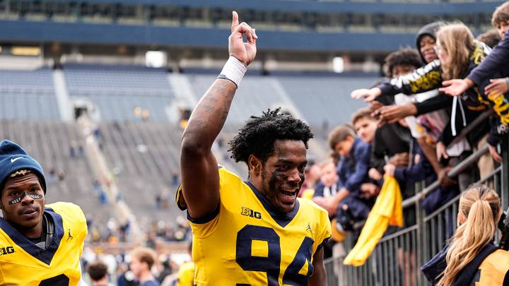 Michigan defensive end Nate Marshall (94) waves at fans as he walks up the tunnel after the spring game at Michigan Stadium in Ann Arbor on Saturday, April 18, 2026.