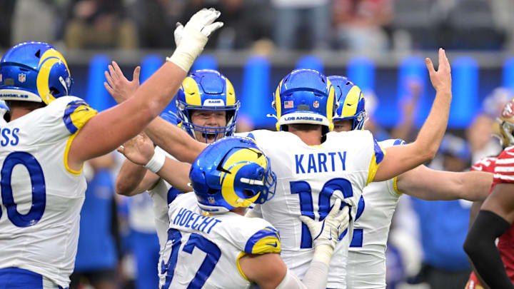 Sep 22, 2024; Inglewood, California, USA;  Los Angeles Rams place kicker Joshua Karty (16) is congratulated after scoring the game winning field goal in the fourth quarter against the San Francisco 49ers at SoFi Stadium. Mandatory Credit: Jayne Kamin-Oncea-Imagn Images