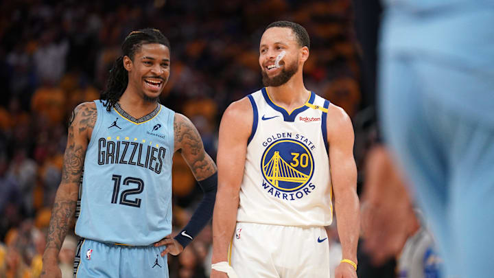Apr 15, 2025; San Francisco, California, USA; Memphis Grizzlies guard Ja Morant (12) talks with Golden State Warriors guard Stephen Curry (30) in between free throw by Curry in the fourth quarter at the Chase Center. Mandatory Credit: Cary Edmondson-Imagn Images Apr 15, 2025; San Francisco, California, USA; Memphis Grizzlies guard Ja Morant (12) talks with Golden State Warriors guard Stephen Curry (30) in between free throw by Curry in the fourth quarter at the Chase Center. Mandatory Credit: Cary Edmondson-Imagn Images