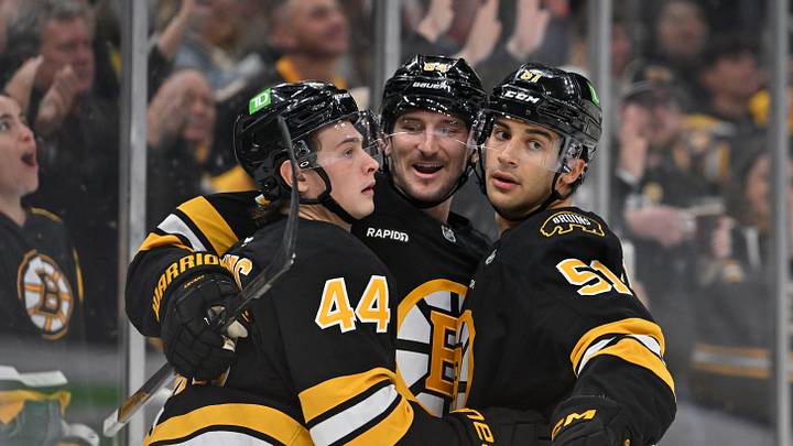 Oct 5, 2026; Boston, Massachusetts, USA; Boston Bruins center James Hagens (44) celebrates his goal against the Ottawa Senators with left wing Tanner Jeannot (84) and center Matthew Poitras (51) during the third period at TD Garden. Mandatory Credit: Eric Canha-Imagn Images