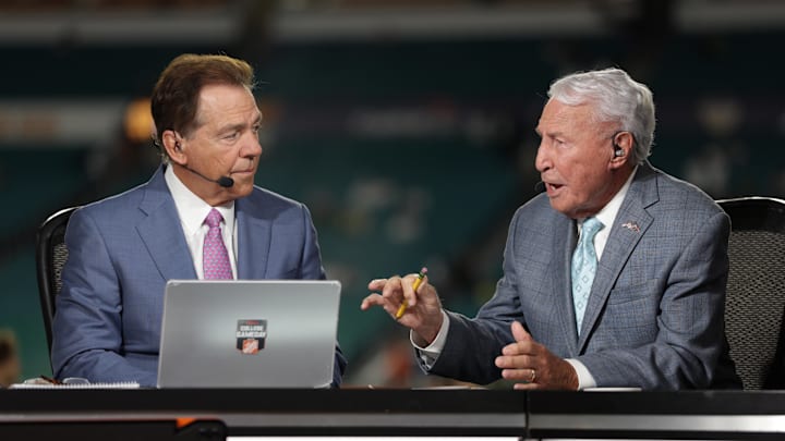 Jan 9, 2025; Miami, FL, USA; ESPN analysts Nick Saban and Lee Corso before the game between the Notre Dame Fighting Irish and the Penn State Nittany Lions in the Orange Bowl at Hard Rock Stadium. Mandatory Credit: Nathan Ray Seebeck-Imagn Images