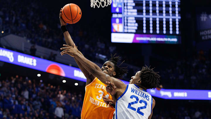 Feb 11, 2025; Lexington, Kentucky, USA; Tennessee Volunteers forward Felix Okpara (34) goes to the basket against Kentucky Wildcats center Amari Williams (22) during the first half at Rupp Arena at Central Bank Center. Mandatory Credit: Jordan Prather-Imagn Images