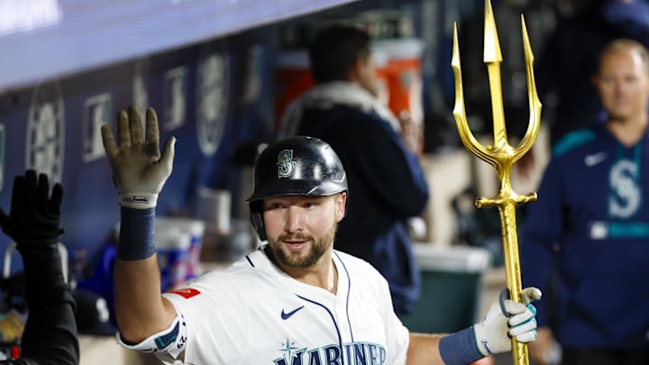 Seattle Mariners catcher Cal Raleigh (29) celebrates in the dugout after hitting a solo-home run against the Texas Rangers during the fifth inning at T-Mobile Park on April 12.
