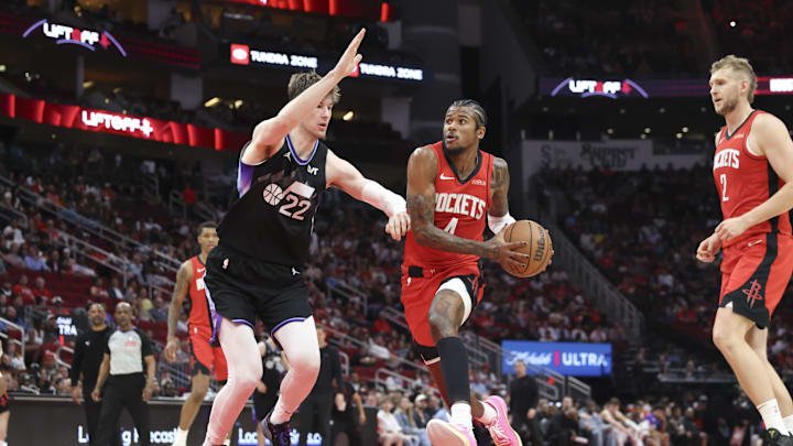 Apr 2, 2025; Houston, Texas, USA; Houston Rockets guard Jalen Green (4) drives with the ball as Utah Jazz forward Kyle Filipowski (22) defends during the third quarter at Toyota Center. Mandatory Credit: Troy Taormina-Imagn Images Apr 2, 2025; Houston, Texas, USA; Houston Rockets guard Jalen Green (4) drives with the ball as Utah Jazz forward Kyle Filipowski (22) defends during the third quarter at Toyota Center. Mandatory Credit: Troy Taormina-Imagn Images
