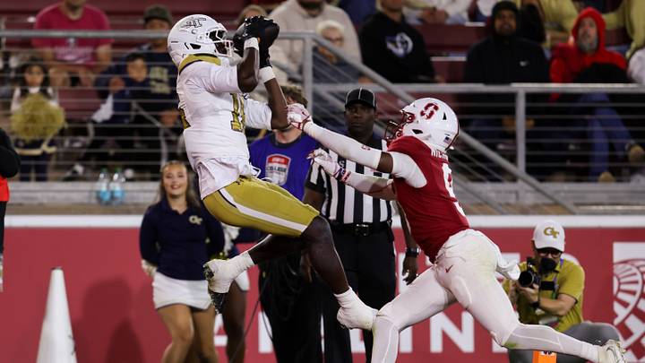 Sep 26, 2026; Stanford, California, USA;  Georgia Tech Yellow Jackets wide receiver Jaiven Plummer (16) catches a touchdown during the fourth quarter against the Stanford Cardinal at Stanford Stadium.  Mandatory Credit: Sergio Estrada-Imagn Images