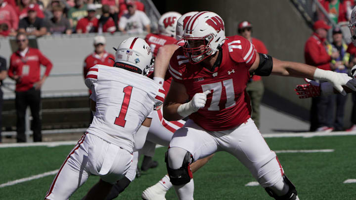 Wisconsin offensive lineman Riley Mahlman (71) provides pass protection during the second quarter of their game against South Dakota Saturday, September 7 , 2024 at Camp Randall Stadium in Madison, Wisconsin. Wisconsin offensive lineman Riley Mahlman (71) provides pass protection during the second quarter of their game against South Dakota Saturday, September 7 , 2024 at Camp Randall Stadium in Madison, Wisconsin.