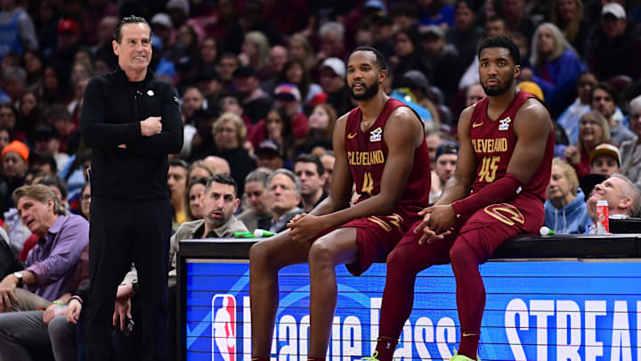 Apr 2, 2025; Cleveland, Ohio, USA; Cleveland Cavaliers forward Evan Mobley (4) and guard Donovan Mitchell (45) wait along side head coach Kenny Atkinson to enter the game during the first half against the New York Knicks at Rocket Arena. Mandatory Credit: Ken Blaze-Imagn Images Apr 2, 2025; Cleveland, Ohio, USA; Cleveland Cavaliers forward Evan Mobley (4) and guard Donovan Mitchell (45) wait along side head coach Kenny Atkinson to enter the game during the first half against the New York Knicks at Rocket Arena. Mandatory Credit: Ken Blaze-Imagn Images