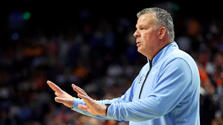 Mar 22, 2025; Lexington, KY, USA;  Creighton Bluejays head coach Greg McDermott reacts during the first half against the Auburn Tigers in the second round to the NCAA Tournament at Rupp Arena. Mandatory Credit: Jordan Prather-Imagn Images