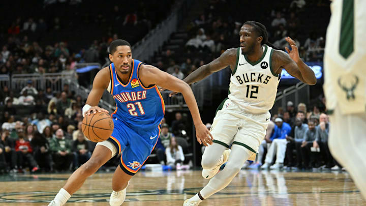 Oct 14, 2025; Milwaukee, Wisconsin, USA; Oklahoma City Thunder guard Aaron Wiggins (21) drives the ball against Milwaukee Bucks forward Taurean Prince (12) during the second half at Fiserv Forum. Mandatory Credit: Patrick Gorski-Imagn Images Oct 14, 2025; Milwaukee, Wisconsin, USA; Oklahoma City Thunder guard Aaron Wiggins (21) drives the ball against Milwaukee Bucks forward Taurean Prince (12) during the second half at Fiserv Forum. Mandatory Credit: Patrick Gorski-Imagn Images