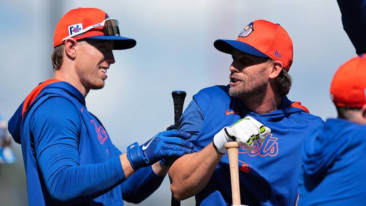 Feb 15, 2025; Port St. Lucie, FL, USA; New York Mets second base Jeff McNeil (1) talks to third base Brett Baty (7) as they batting practice during spring training at Clover Park. Mandatory Credit: Sam Navarro-Imagn Images