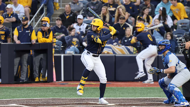 West Virginia University designated hitter Kyle West