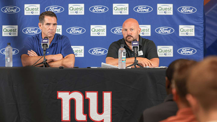 Jul 24, 2024; East Rutherford, NJ, USA; New York Giants general manager Joe Schoen (left) and head coach Brian Dabol talks to media before the start of training camp at Quest Diagnostics Training Facility. Mandatory Credit: Vincent Carchietta-Imagn Images