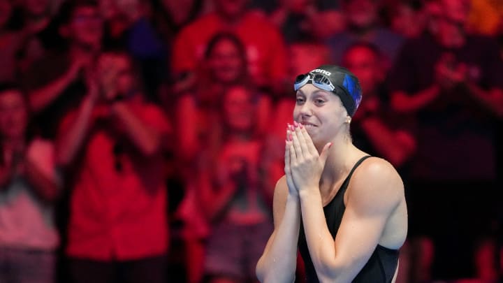 Gretchen Walsh reacts after setting a world record during the 100 butterfly semifinals Saturday, June 15, 2024, during the first day of competition for the U.S. Olympic Team Swimming Trials at Lucas Oil Stadium in Indianapolis.