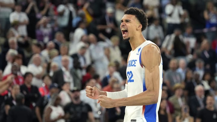 Aug 8, 2024; Paris, France; France power forward Victor Wembanyama (32) celebrates after the game against Germany in a men's basketball semifinal game during the Paris 2024 Olympic Summer Games at Accor Arena. Mandatory Credit: Kyle Terada-USA TODAY Sports Aug 8, 2024; Paris, France; France power forward Victor Wembanyama (32) celebrates after the game against Germany in a men's basketball semifinal game during the Paris 2024 Olympic Summer Games at Accor Arena. Mandatory Credit: Kyle Terada-USA TODAY Sports