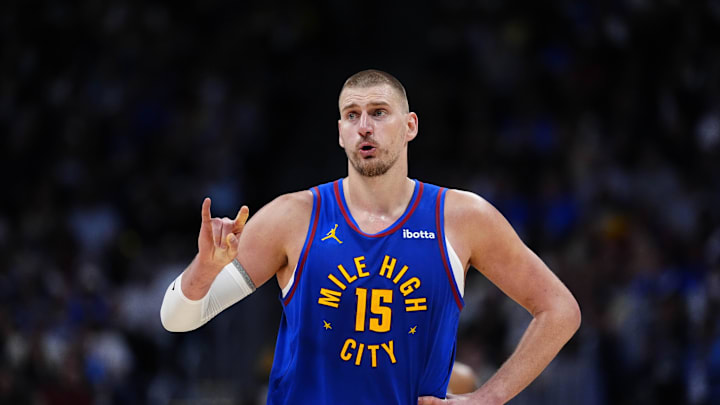 Apr 20, 2026; Denver, Colorado, USA; Denver Nuggets center Nikola Jokic (15) reacts towards the bench in the second half against the Minnesota Timberwolves during game two of the first round of the 2026 NBA Playoffs at Ball Arena. 
