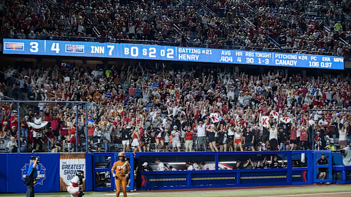 Jun 5, 2025; Oklahoma City, OK, USA;  Texas Tech Red Raiders fans cheer after Texas Tech Red Raiders pitcher NiJaree Canady strikes out Texas Longhorns outfielder Kayden Henry (21) for the final out, defeating the Longhorns  NCAA Softball Women's College World Series finals at Devon Park. Mandatory Credit: Brett Rojo-Imagn Images