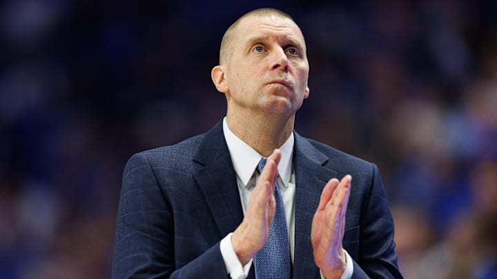 Jan 4, 2025; Lexington, Kentucky, USA; Kentucky Wildcats head coach Mark Pope claps during the first half against the Florida Gators at Rupp Arena at Central Bank Center. Mandatory Credit: Jordan Prather-Imagn Images