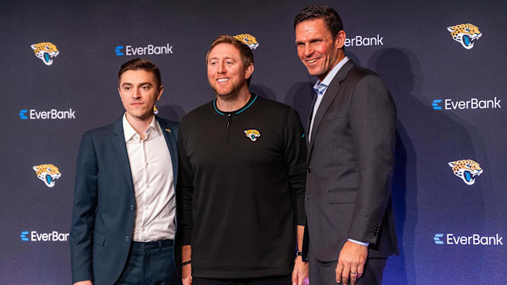 Jacksonville Jaguars new General Manager James Gladstone, left, poses for pictures with Head Coach Liam Coen, center and Executive Vice President of Football Operations Tony Boselli, right, during a press conference Monday morning February 24, 2025 at the Miller Electric Center in Jacksonville, Fla. [Doug Engle/Florida Times-Union]2025