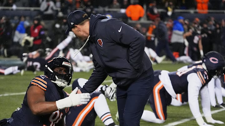 Jan 18, 2026; Chicago, IL, USA; Chicago Bears head coach Ben Johnson shakes hands with defensive end Kobie Turner (91) during warmups before an NFC Divisional Round game against the Los Angeles Rams at Soldier Field. Mandatory Credit: David Banks-Imagn Images Jan 18, 2026; Chicago, IL, USA; Chicago Bears head coach Ben Johnson shakes hands with defensive end Kobie Turner (91) during warmups before an NFC Divisional Round game against the Los Angeles Rams at Soldier Field. Mandatory Credit: David Banks-Imagn Images