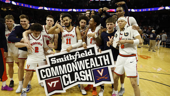 Mar 7, 2026; Charlottesville, Virginia, USA; Virginia Cavaliers players celebrate after winning the Commonwealth Clash game against the Virginia Tech Hokies at John Paul Jones Arena. Mandatory Credit: Geoff Burke-Imagn Images Mar 7, 2026; Charlottesville, Virginia, USA; Virginia Cavaliers players celebrate after winning the Commonwealth Clash game against the Virginia Tech Hokies at John Paul Jones Arena. Mandatory Credit: Geoff Burke-Imagn Images