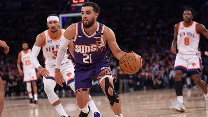 Apr 6, 2025; New York, New York, USA; Phoenix Suns guard Tyus Jones (21) rebounds during the second half against the New York Knicks at Madison Square Garden. Mandatory Credit: Vincent Carchietta-Imagn Images