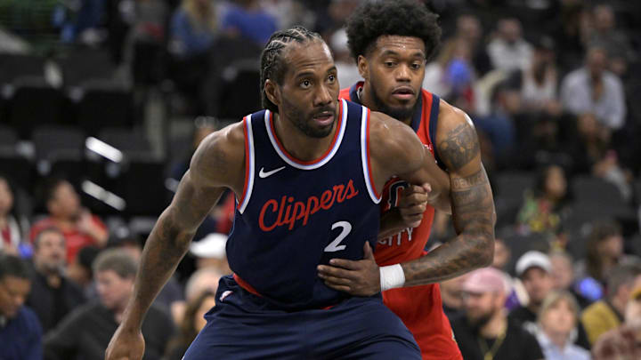 Apr 2, 2025; Inglewood, California, USA;   Los Angeles Clippers forward Kawhi Leonard (2) boxes out New Orleans Pelicans forward Keion Brooks Jr. (0) in the first half at Intuit Dome. Mandatory Credit: Jayne Kamin-Oncea-Imagn Images