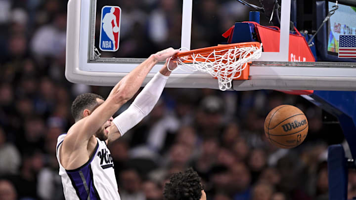 Feb 10, 2025; Dallas, Texas, USA; Sacramento Kings guard Zach LaVine (8) dunks the ball against the Dallas Mavericks during the second quarter at the American Airlines Center. Mandatory Credit: Jerome Miron-Imagn Images