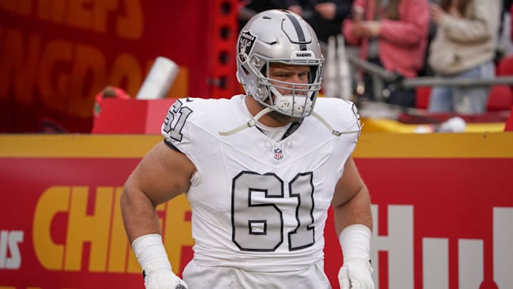 Dec 25, 2023; Kansas City, Missouri, USA; Las Vegas Raiders guard Jordan Meredith (61) runs onto the field against the Kansas City Chiefs prior to a game at GEHA Field at Arrowhead Stadium. Mandatory Credit: Denny Medley-Imagn Images Dec 25, 2023; Kansas City, Missouri, USA; Las Vegas Raiders guard Jordan Meredith (61) runs onto the field against the Kansas City Chiefs prior to a game at GEHA Field at Arrowhead Stadium. Mandatory Credit: Denny Medley-Imagn Images