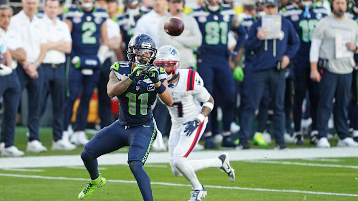 Feb 8, 2026; Santa Clara, CA, USA; Seattle Seahawks wide receiver Jaxon Smith-Njigba (11) makes a c atch against New England Patriots cornerback Carlton Davis III (7) during the first quarter in Super Bowl LX at Levi's Stadium. Mandatory Credit: Darren Yamashita-Imagn Images Feb 8, 2026; Santa Clara, CA, USA; Seattle Seahawks wide receiver Jaxon Smith-Njigba (11) makes a c atch against New England Patriots cornerback Carlton Davis III (7) during the first quarter in Super Bowl LX at Levi's Stadium. Mandatory Credit: Darren Yamashita-Imagn Images