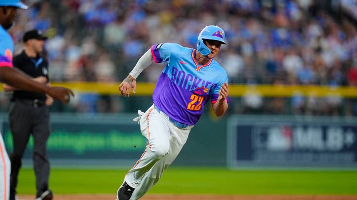 Mickey Moniak heads home to score a run in the first inning against the Kansas City Royals at Coors Field. Mickey Moniak heads home to score a run in the first inning against the Kansas City Royals at Coors Field.