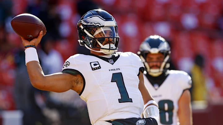 Dec 22, 2024; Landover, Maryland, USA; Philadelphia Eagles quarterback Jalen Hurts (1) warms up before the game against the Washington Commanders at Northwest Stadium. Mandatory Credit: Peter Casey-Imagn Images