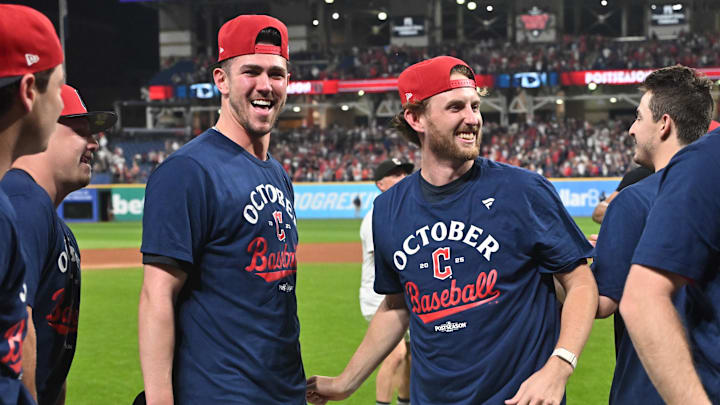 Sep 27, 2025; Cleveland, Ohio, USA; Cleveland Guardians outfielder Nolan Jones celebrates with starting pitcher Tanner Bibee (28) after the Guardians beat the Texas Rangers to secure a playoff berth at Progressive Field. Mandatory Credit: Ken Blaze-Imagn Images Sep 27, 2025; Cleveland, Ohio, USA; Cleveland Guardians outfielder Nolan Jones celebrates with starting pitcher Tanner Bibee (28) after the Guardians beat the Texas Rangers to secure a playoff berth at Progressive Field. Mandatory Credit: Ken Blaze-Imagn Images