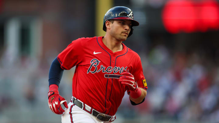 Jun 28, 2024; Atlanta, Georgia, USA; Atlanta Braves third baseman Austin Riley (27) hits a home run against the Pittsburgh Pirates in the second inning at Truist Park. Mandatory Credit: Brett Davis-USA TODAY Sports
