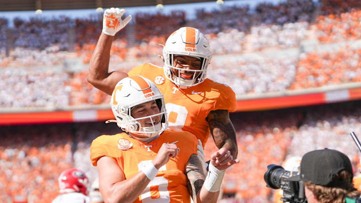 Tennessee quarterback Joey Aguilar (6) and running back DeSean Bishop (18) celebrate Aguilar's touchdown during an NCAA college football game against Georgia on September 13, 2025, Knoxville, Tennessee.