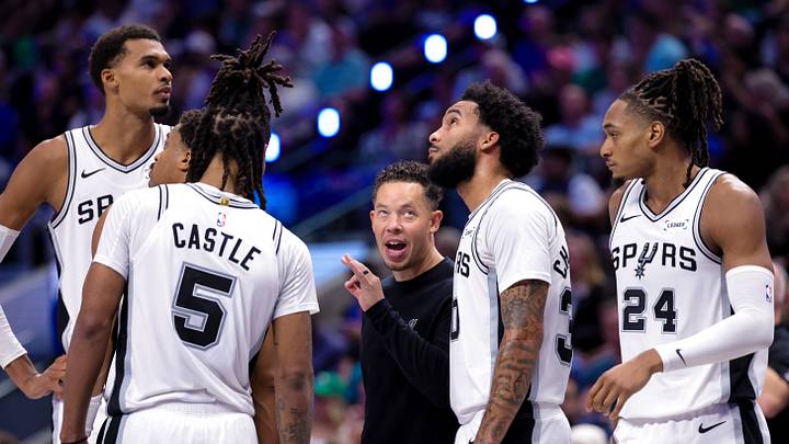 Oct 24, 2026; Dallas, Texas, USA; San Antonio Spurs coach Mitch Johnson speaks with his team during the third quarter against the Dallas Mavericks at American Airlines Center. Oct 24, 2026; Dallas, Texas, USA; San Antonio Spurs coach Mitch Johnson speaks with his team during the third quarter against the Dallas Mavericks at American Airlines Center.