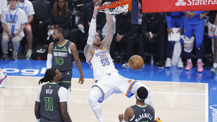 May 20, 2025; Oklahoma City, Oklahoma, USA; Oklahoma City Thunder center Isaiah Hartenstein (55) dunks against Minnesota Timberwolves center Naz Reid (11) and forward Jaden McDaniels (3) during the first quarter in Game 1 of the Western Conference Finals at Paycom Center. Mandatory Credit: Alonzo Adams-Imagn Images May 20, 2025; Oklahoma City, Oklahoma, USA; Oklahoma City Thunder center Isaiah Hartenstein (55) dunks against Minnesota Timberwolves center Naz Reid (11) and forward Jaden McDaniels (3) during the first quarter in Game 1 of the Western Conference Finals at Paycom Center. Mandatory Credit: Alonzo Adams-Imagn Images