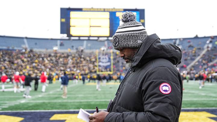 Detroit Lions general manager Brad Holmes watches warmups between Michigan and Ohio State at Michigan Stadium in Ann Arbor on Saturday, Nov. 29, 2025. Detroit Lions general manager Brad Holmes watches warmups between Michigan and Ohio State at Michigan Stadium in Ann Arbor on Saturday, Nov. 29, 2025.