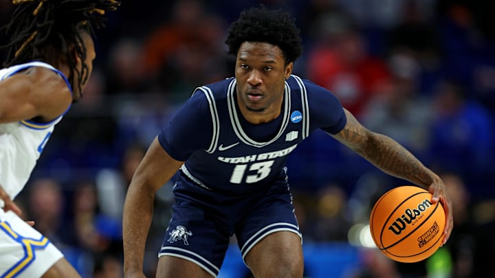 Utah State Aggies guard Deyton Albury (13). Utah State Aggies guard Deyton Albury (13).