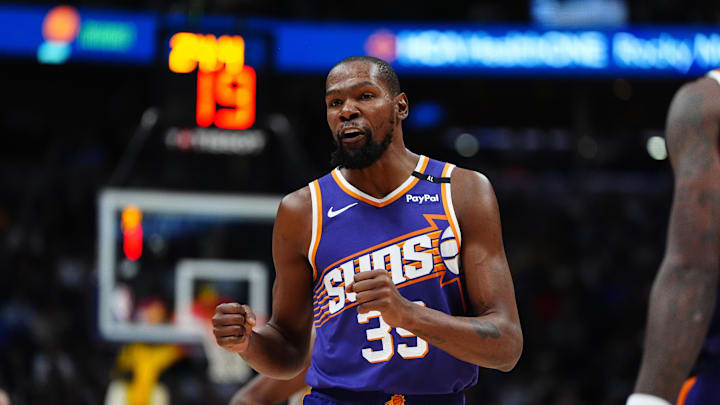 Dec 23, 2024; Denver, Colorado, USA; Phoenix Suns forward Kevin Durant (35) reacts in the second half against the Denver Nuggets at Ball Arena. Mandatory Credit: Ron Chenoy-Imagn Images