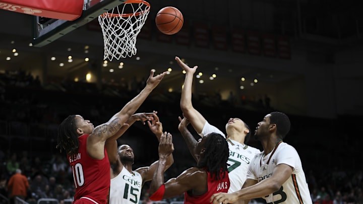Jan 10, 2024; Coral Gables, Florida, USA; Louisville Cardinals forward Kaleb Glenn (10) and guard