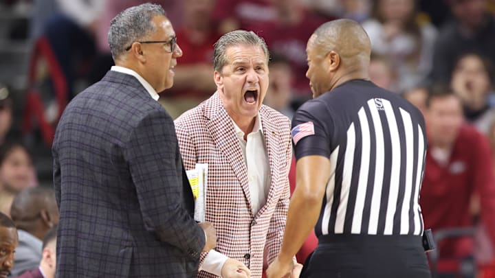 Arkansas Razorbacks head coach John Calipari talks to an official during the first half against the Missouri Tigers at Bud Walton Arena. 