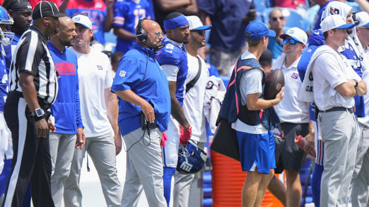 Aug 9, 2025; Orchard Park, New York, USA; New York Giants head coach Brian Daboll walks the sidelines during the first half against the Buffalo Bills at Highmark Stadium. Mandatory Credit: Gregory Fisher-Imagn Images