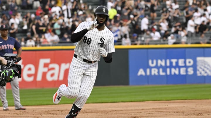 Jun 7, 2024; Chicago, Illinois, USA;  Chicago White Sox outfielder Luis Robert Jr. (88) points after he hits a home run against the Boston Red Sox during the first inning at Guaranteed Rate Field.
