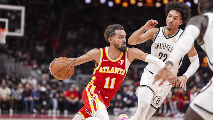Oct 23, 2024; Atlanta, Georgia, USA; Atlanta Hawks guard Trae Young (11) dribbles against Brooklyn Nets forward Jalen Wilson (22) during the second half at State Farm Arena. Mandatory Credit: Dale Zanine-Imagn Images Oct 23, 2024; Atlanta, Georgia, USA; Atlanta Hawks guard Trae Young (11) dribbles against Brooklyn Nets forward Jalen Wilson (22) during the second half at State Farm Arena. Mandatory Credit: Dale Zanine-Imagn Images