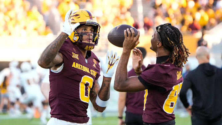 Aug 30, 2025; Tempe, Arizona, USA; Arizona State Sun Devils wide receiver Jordyn Tyson (0) dances with Arizona State Sun Devils wide receiver Zechariah Sample (87) before the game against Northern Arizona Lumberjacks at Mountain America Stadium, Home of the ASU Sun Devils. Mandatory Credit: Arianna Grainey-Imagn Images